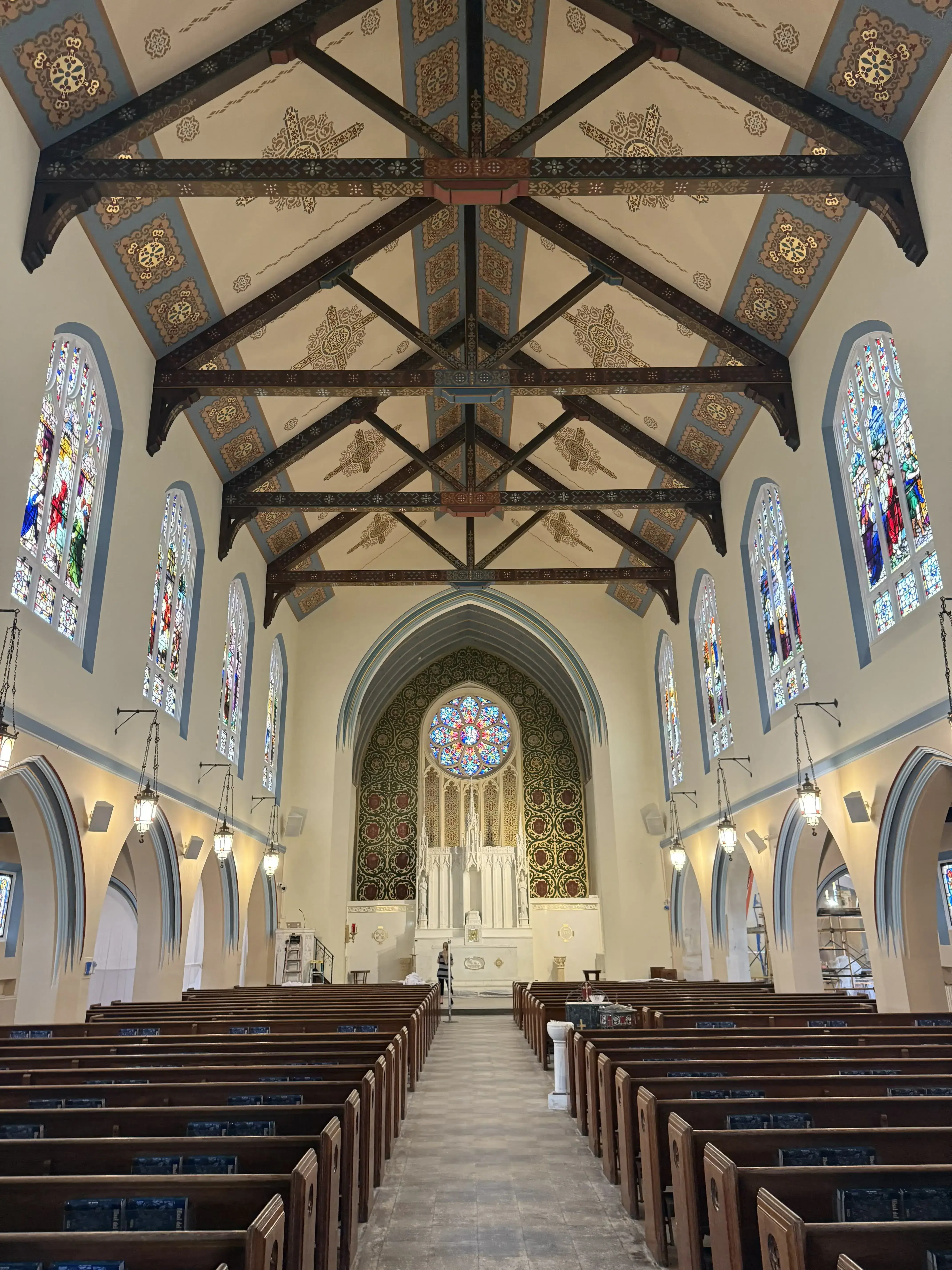 Church restoration after plaster work showing restored decorative elements